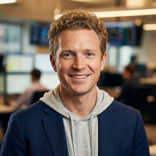 Foto de perfil de Ryan Brooks, identificado como analista principal de trading en Cima Rendazgo